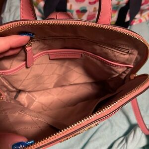 Michael Kors Pink and cream backpack.